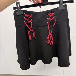 Hot Topic Black Skirt with Red Lace-Up Accents